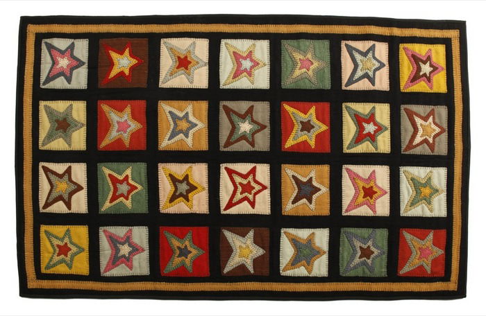 Primitive star-patch penny rugs